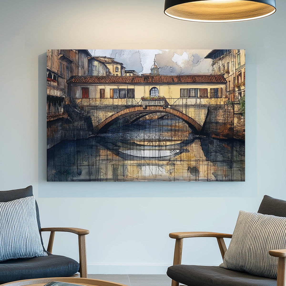 Watercolour and ink artwork of an old European bridge over a river, with reflections in the water and surrounding historic buildings.