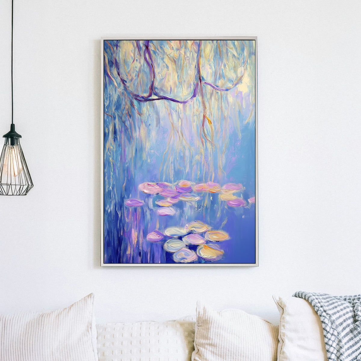 Impressionist wall art of a willow tree overhanging a pond with floating lily pads in soft blues, purples, and gold tones.