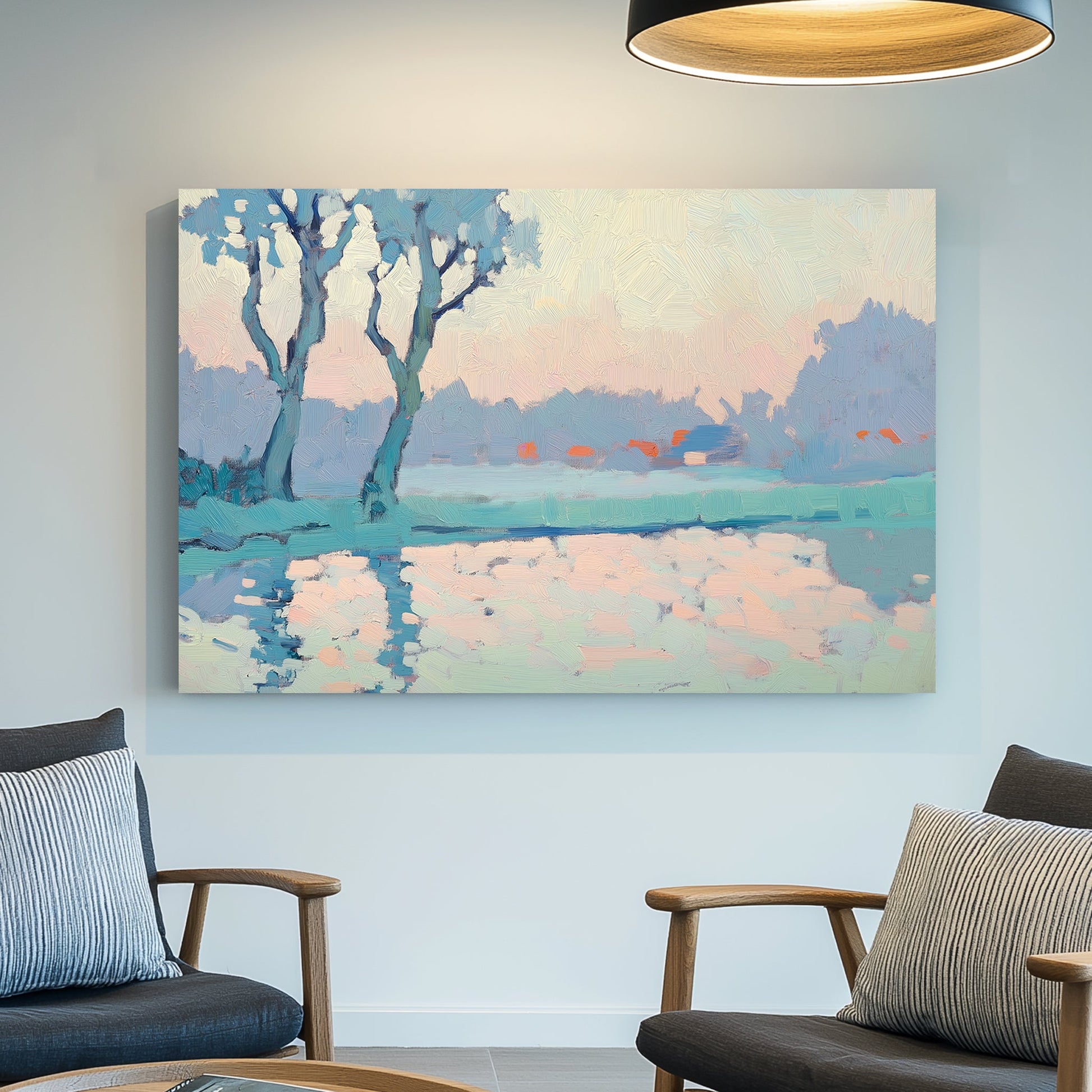 Impressionist wall art of trees reflecting on a calm lake at sunrise, in soft blue, peach, and pastel tones.
