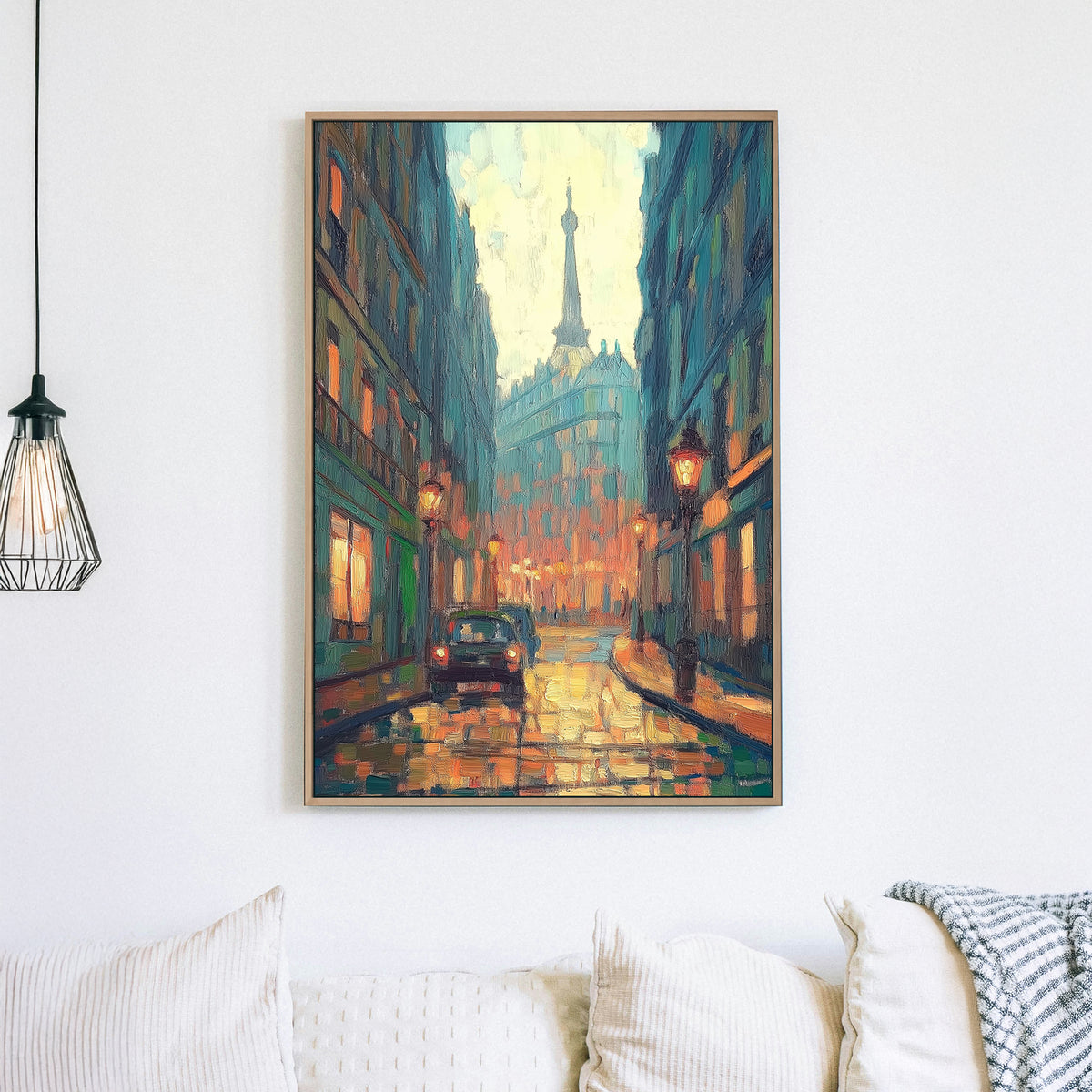 Oil wall art of a rainy Paris street at dusk, with glowing streetlights reflecting off the wet cobblestones and the Eiffel Tower in the distance.