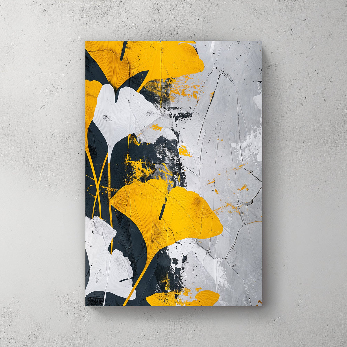 Abstract wall art of golden-yellow ginkgo leaves against a black, white, and grey textured background.