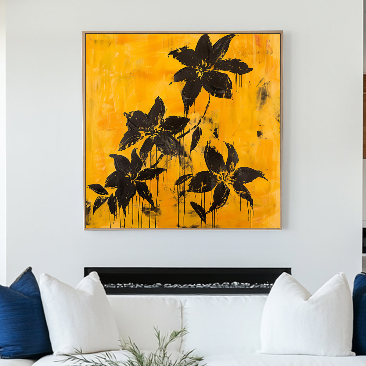 Abstract black floral wall art with dripping petals on a textured golden yellow background.