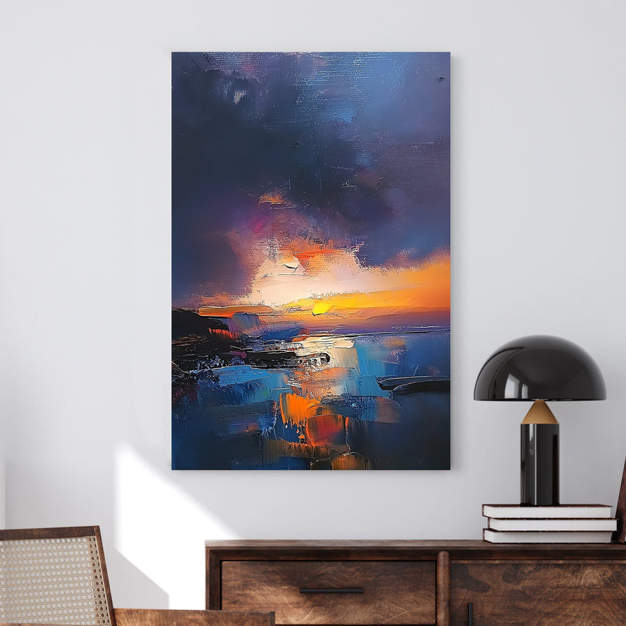 Textured oil wall art of a sunset over a coastal scene with deep blues, fiery oranges, and a moody twilight sky.