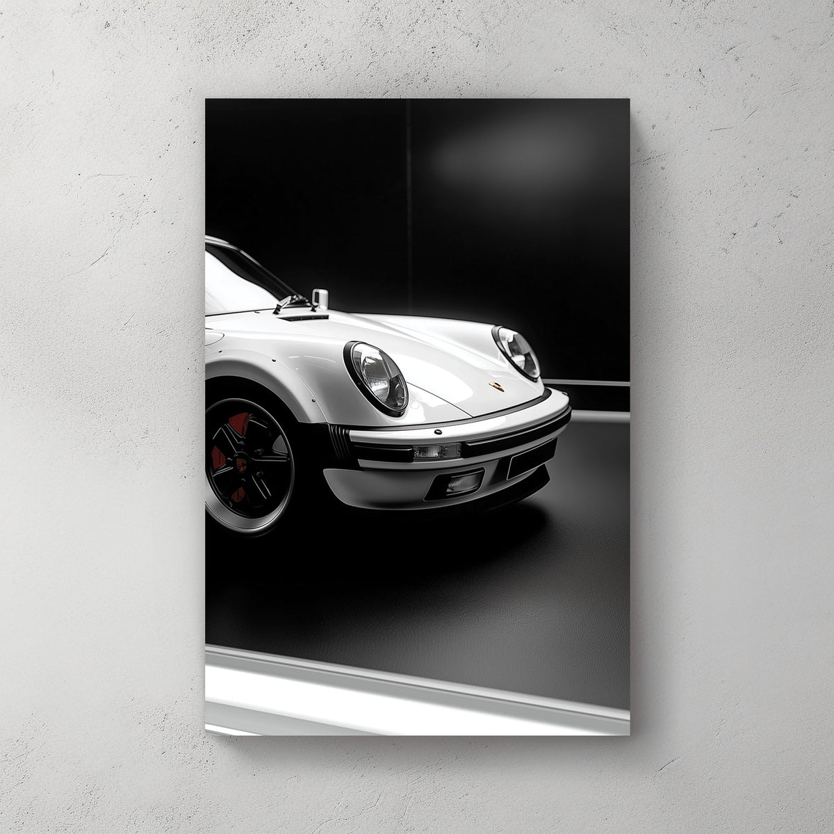 Close-up of a white Porsche 911 against a black background, showcasing its sleek design and iconic headlights.