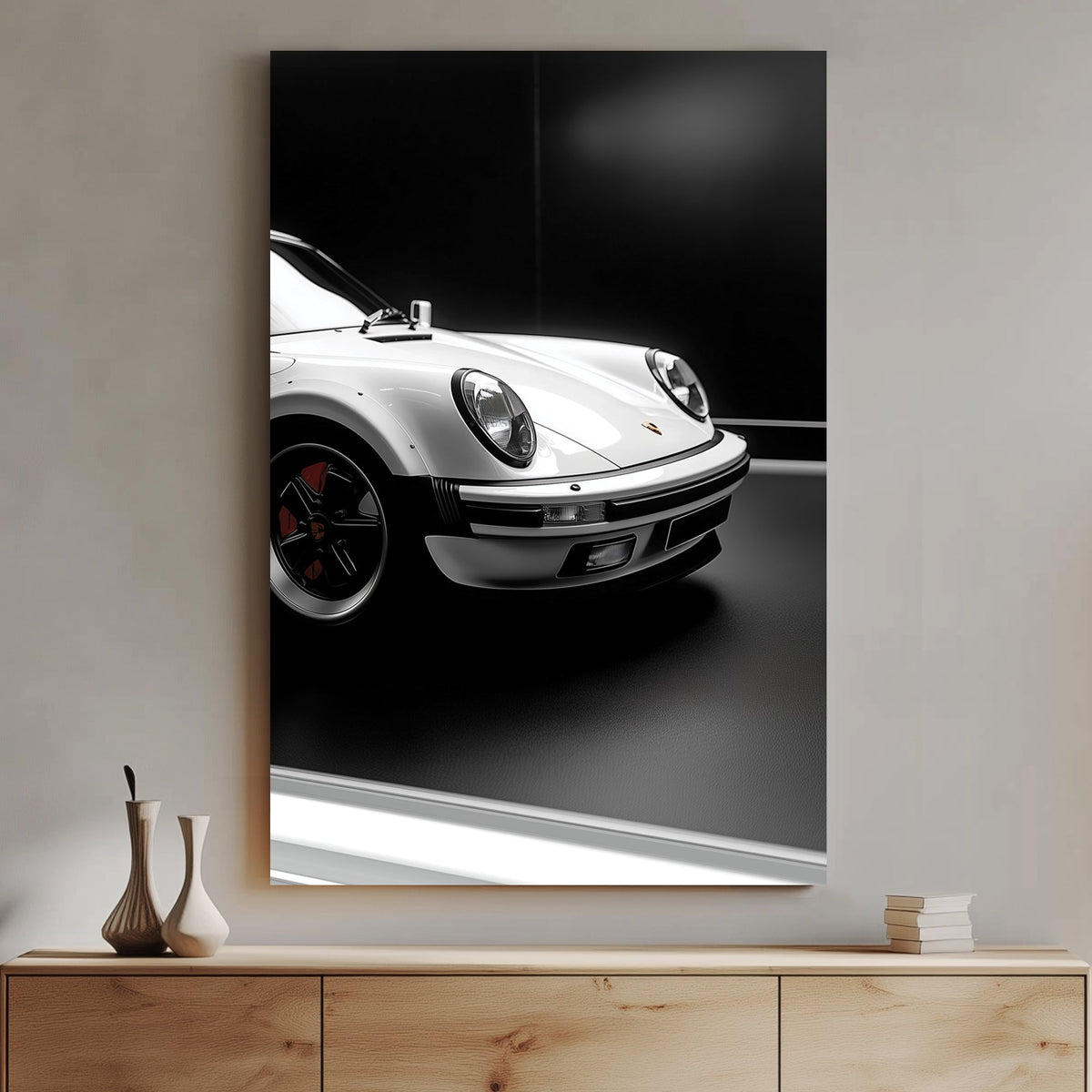 Close-up of a white Porsche 911 against a black background, showcasing its sleek design and iconic headlights.