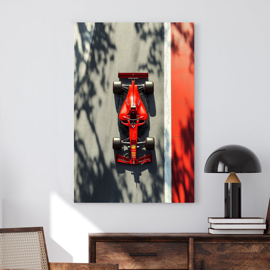 Formula 1 red Ferrari race car wall art with track and shadows.