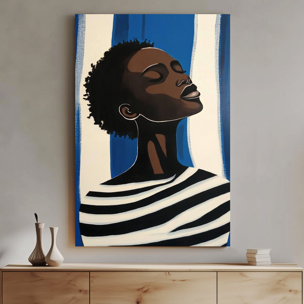 Minimalist portrait wall art of a woman in striped clothing against a blue and white background.