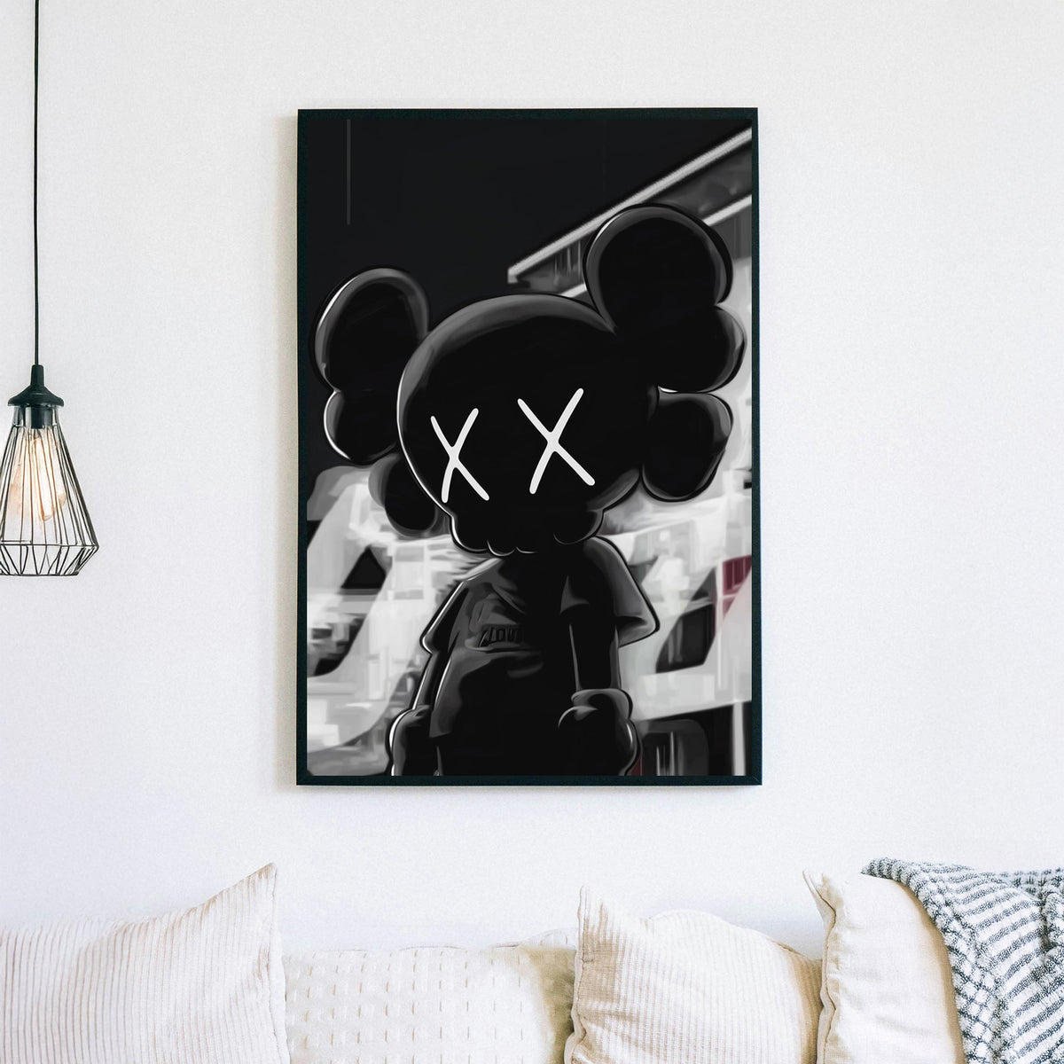 Black and white street-style wall art featuring an KAWS character with X eyes.