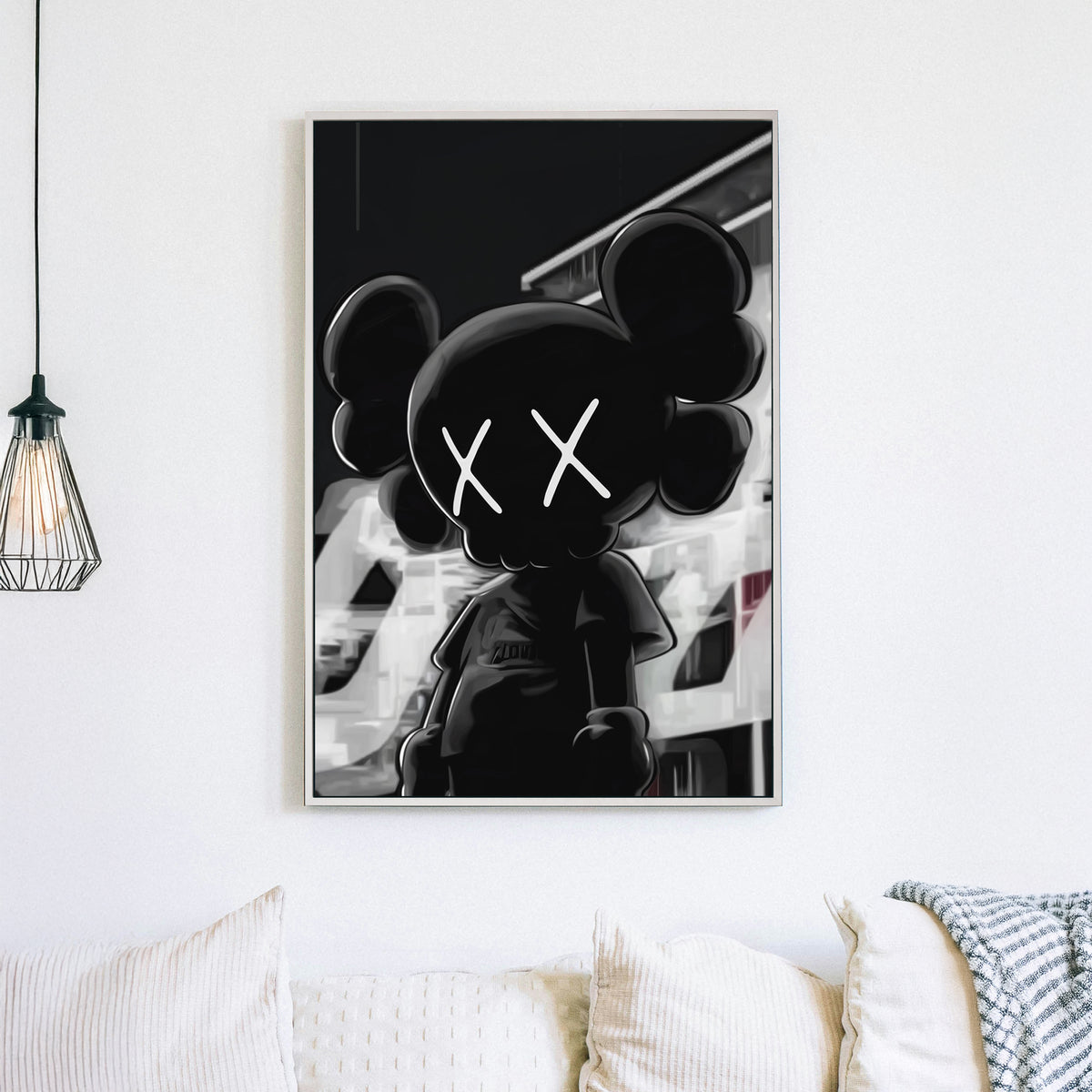 Black and white street-style wall art featuring an KAWS character with X eyes.