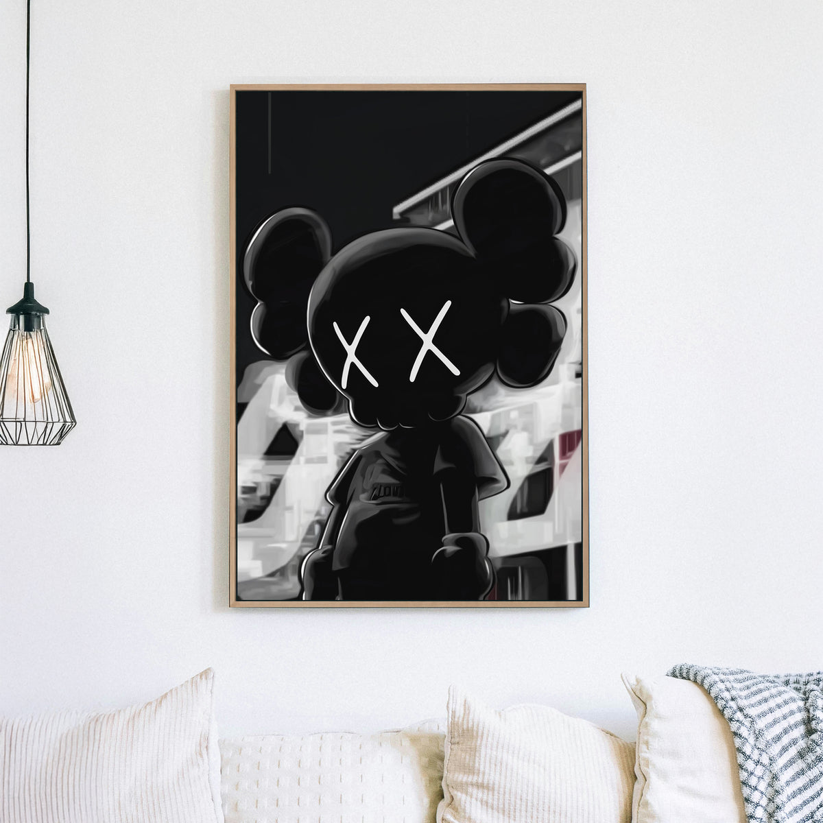 Black and white street-style wall art featuring an KAWS character with X eyes.