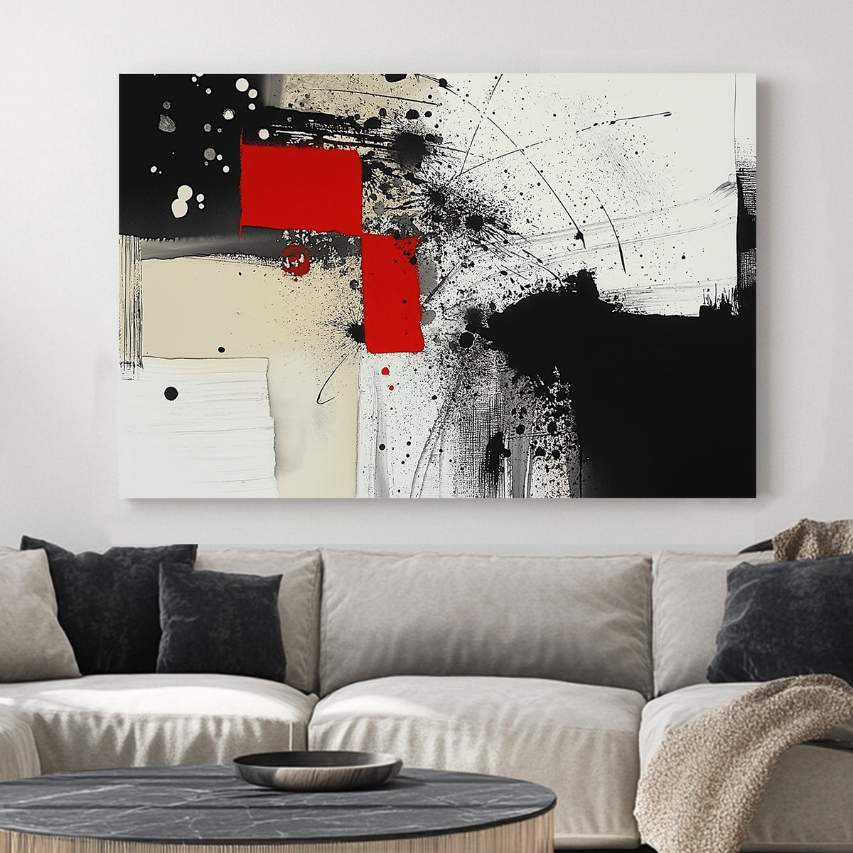 Abstract black, white, and red wall art with geometric accents and paint splatters.