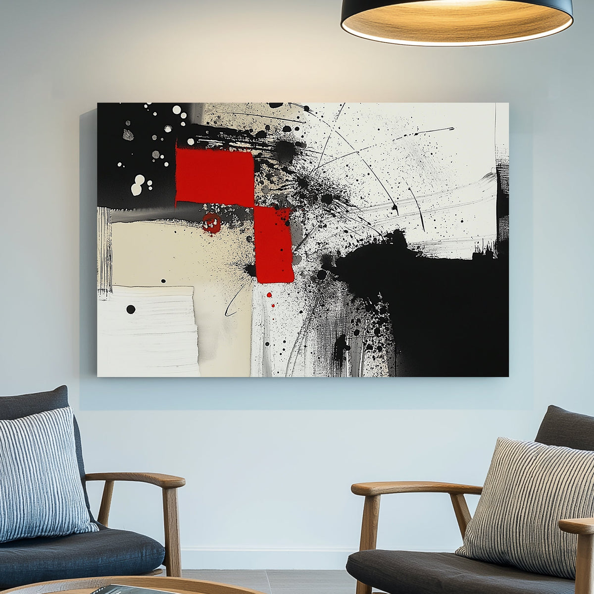 Abstract black, white, and red wall art with geometric accents and paint splatters.