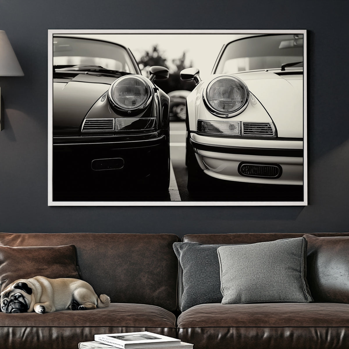 Black and white wall art featuring two vintage Porsche 911 cars parked side by side in a striking monochrome composition.