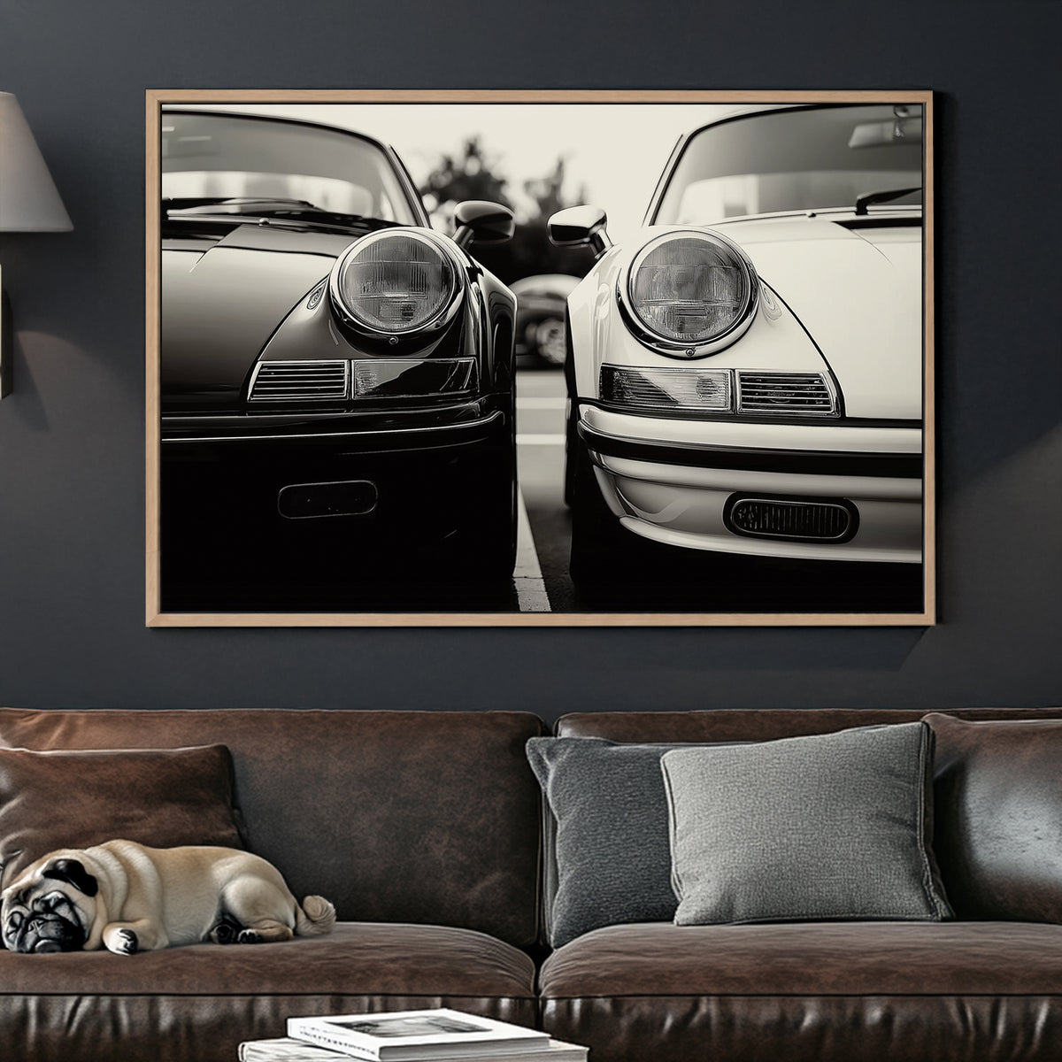 Black and white wall art featuring two vintage Porsche 911 cars parked side by side in a striking monochrome composition.