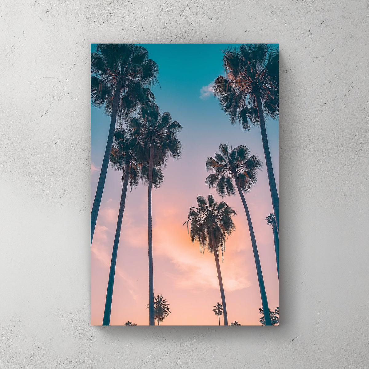Tropical palm trees at sunset wall art with pastel sky.