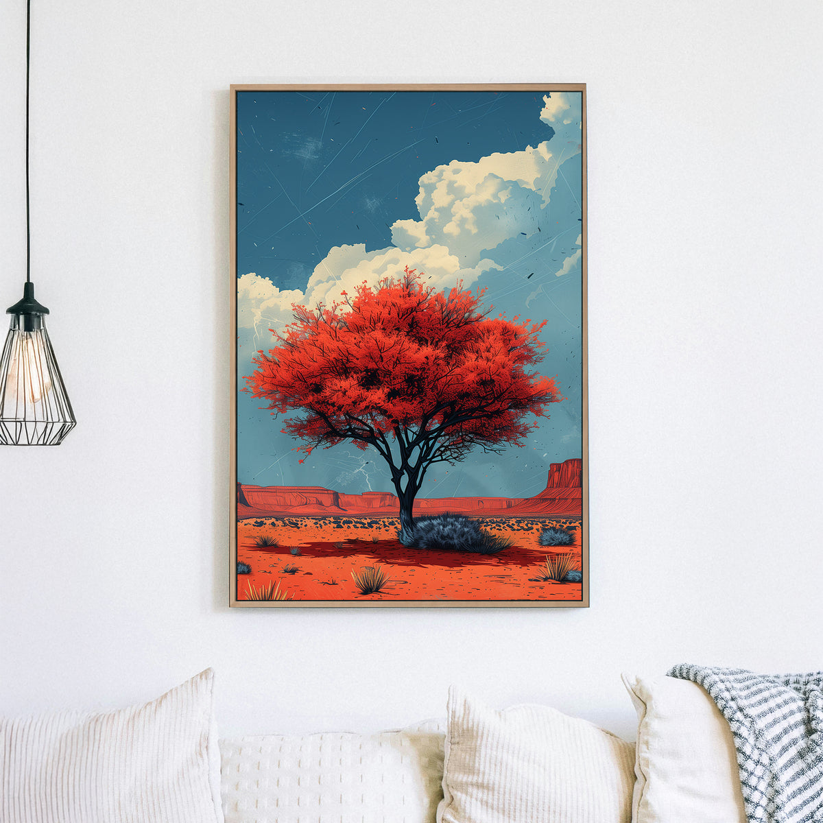 Lone crimson tree in a desert landscape wall art, bold blue sky and rugged canyon backdrop.