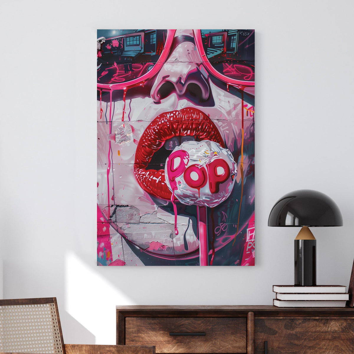 Graffiti-style wall art featuring glossy red lips, a dripping lollipop, and vibrant pink urban textures.
