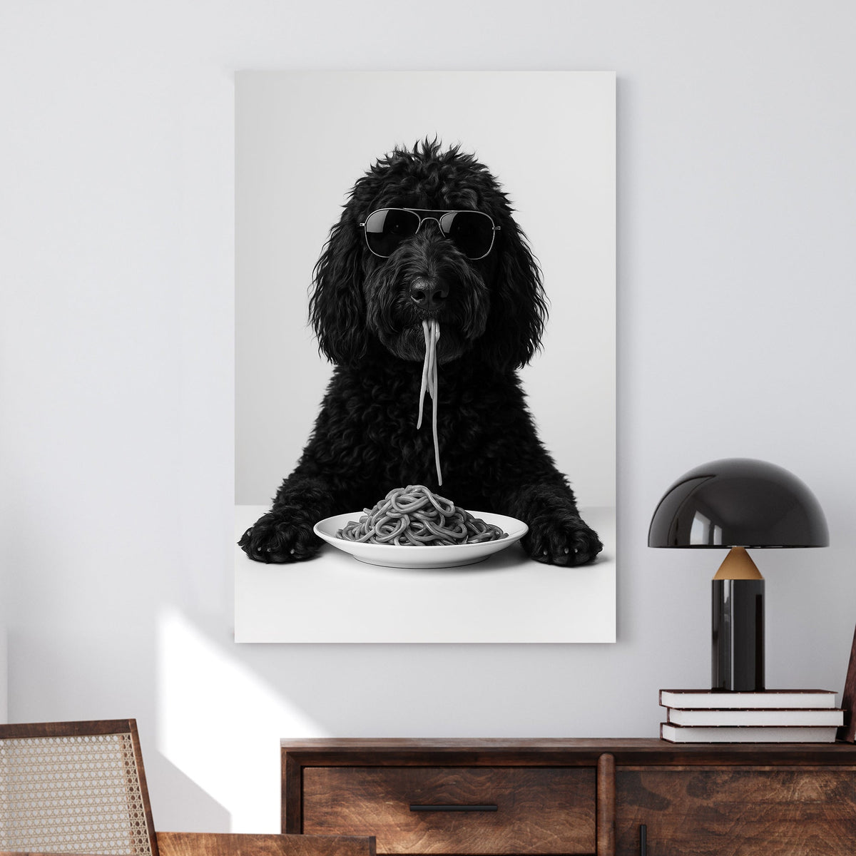 Black dog golden doodle wearing sunglasses eating spaghetti at a table wall art