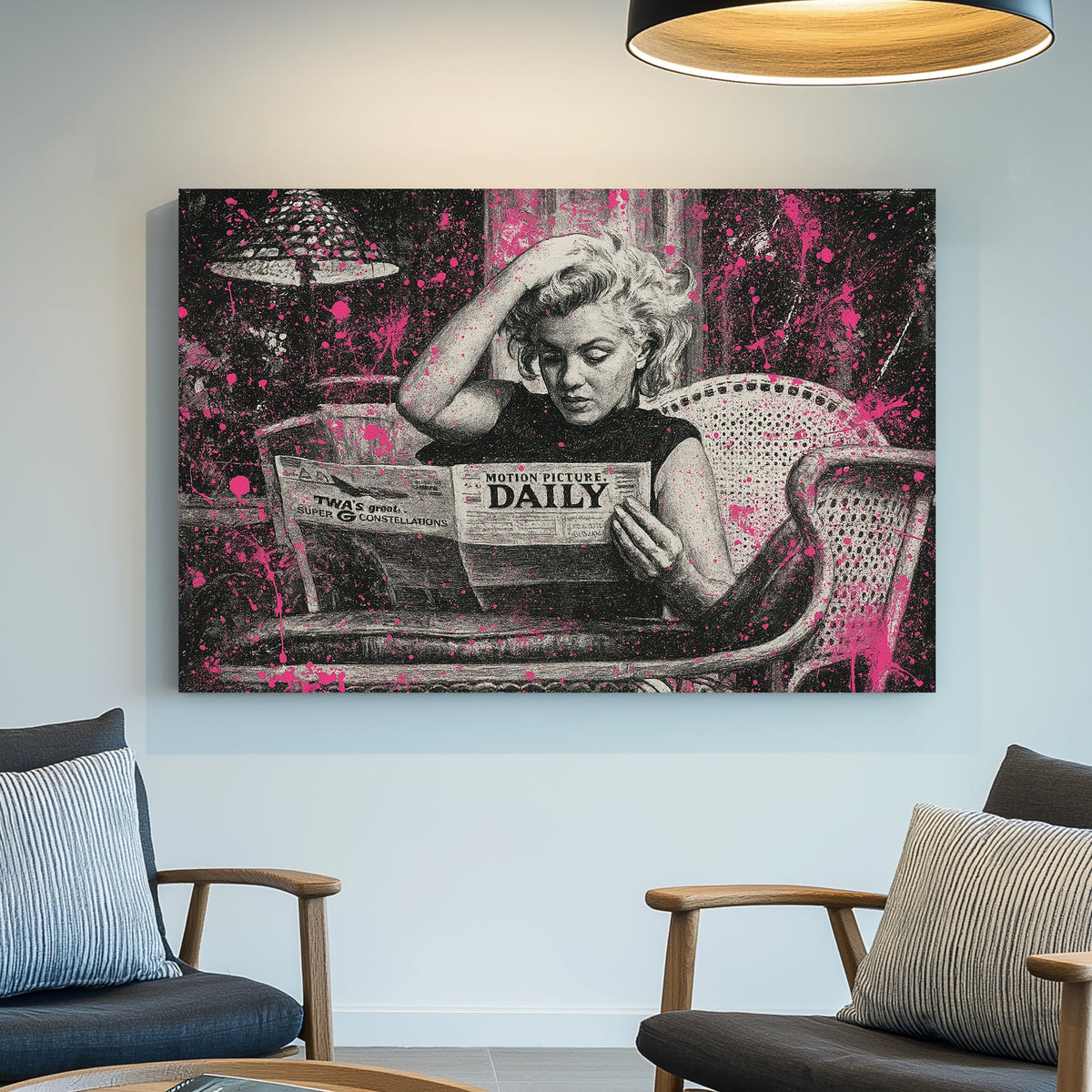 Marilyn Monroe reading newspaper in black and white with pink paint splatter wall art