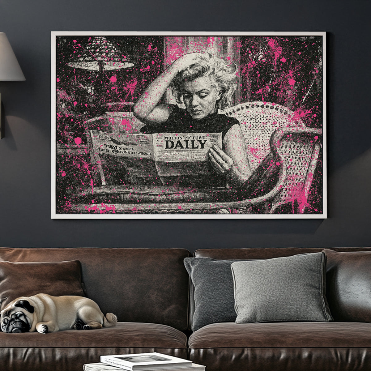 Marilyn Monroe reading newspaper in black and white with pink paint splatter wall art