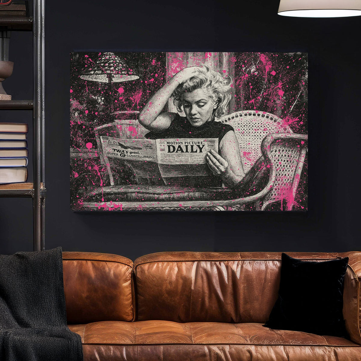 Marilyn Monroe reading newspaper in black and white with pink paint splatter wall art