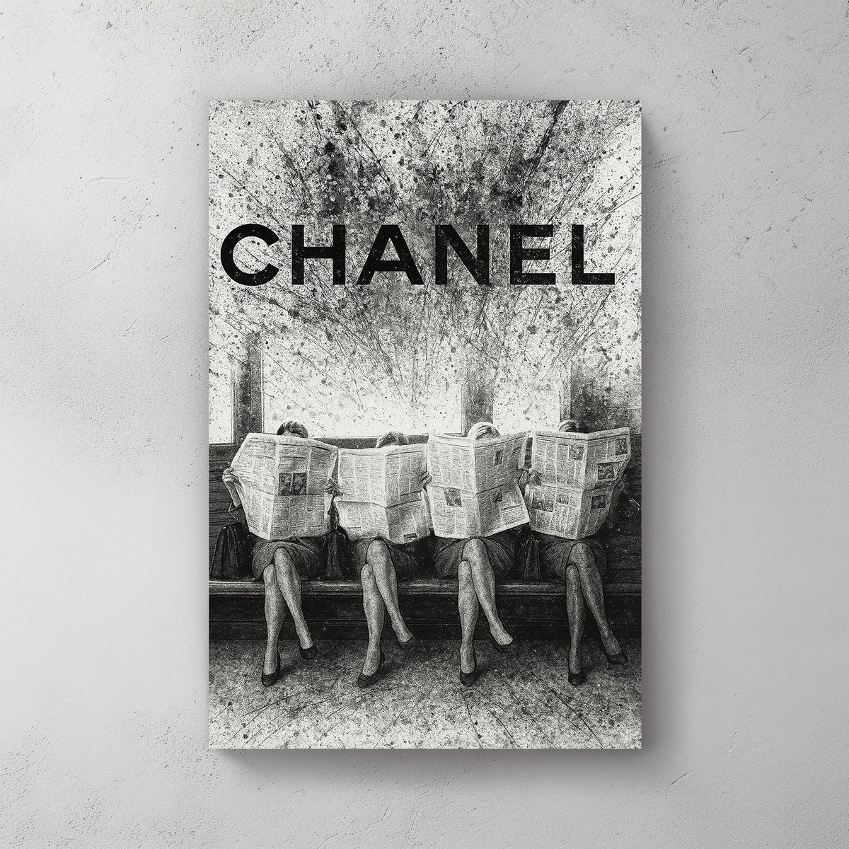 Chanel fashion-inspired wall art with women reading newspapers in black and white