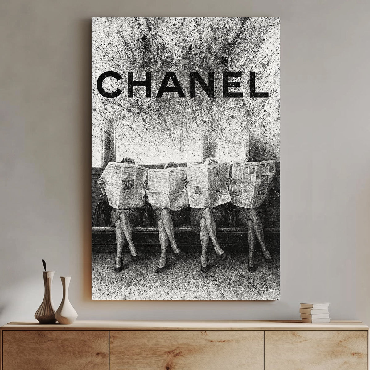 Chanel fashion-inspired wall art with women reading newspapers in black and white