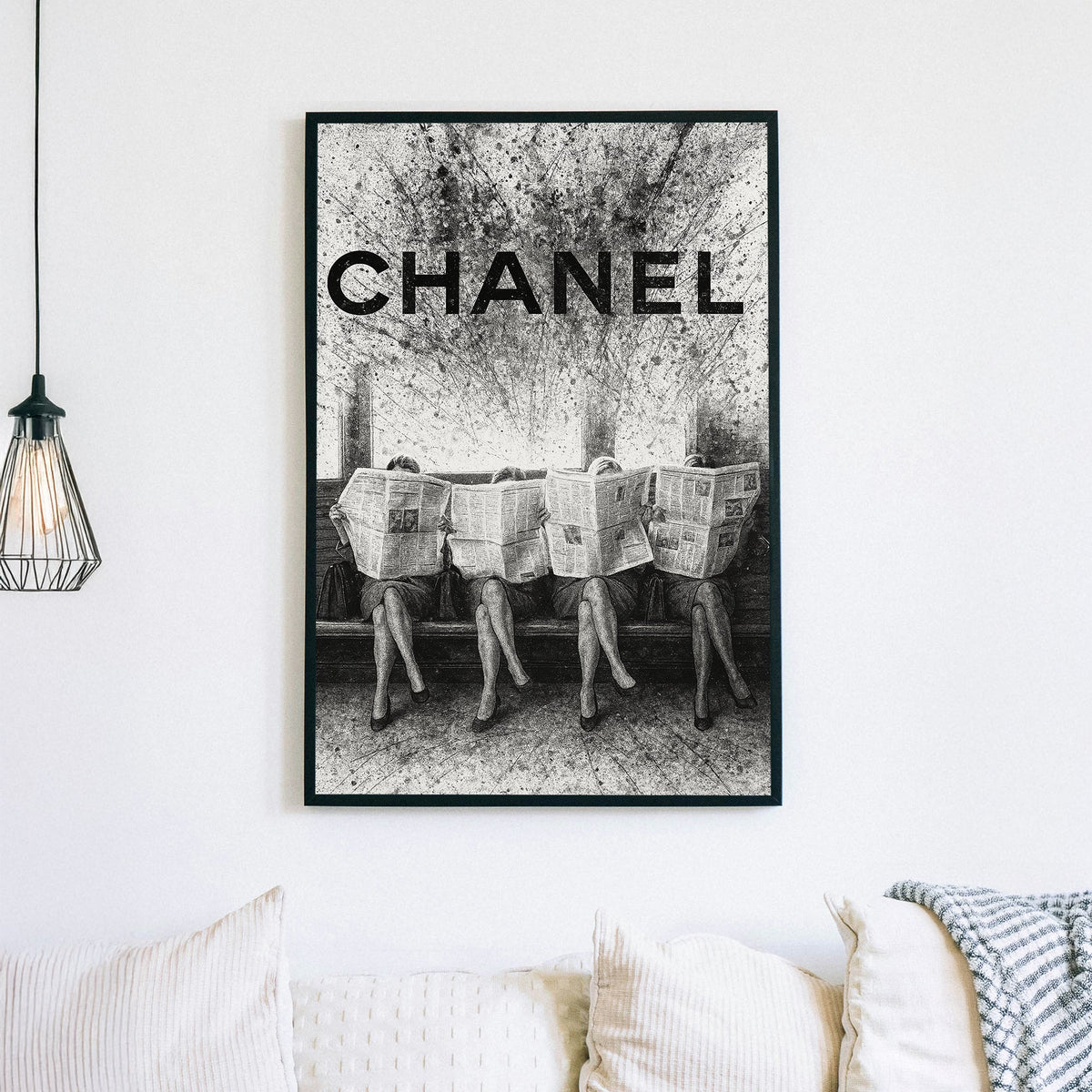 Chanel fashion-inspired wall art with women reading newspapers in black and white
