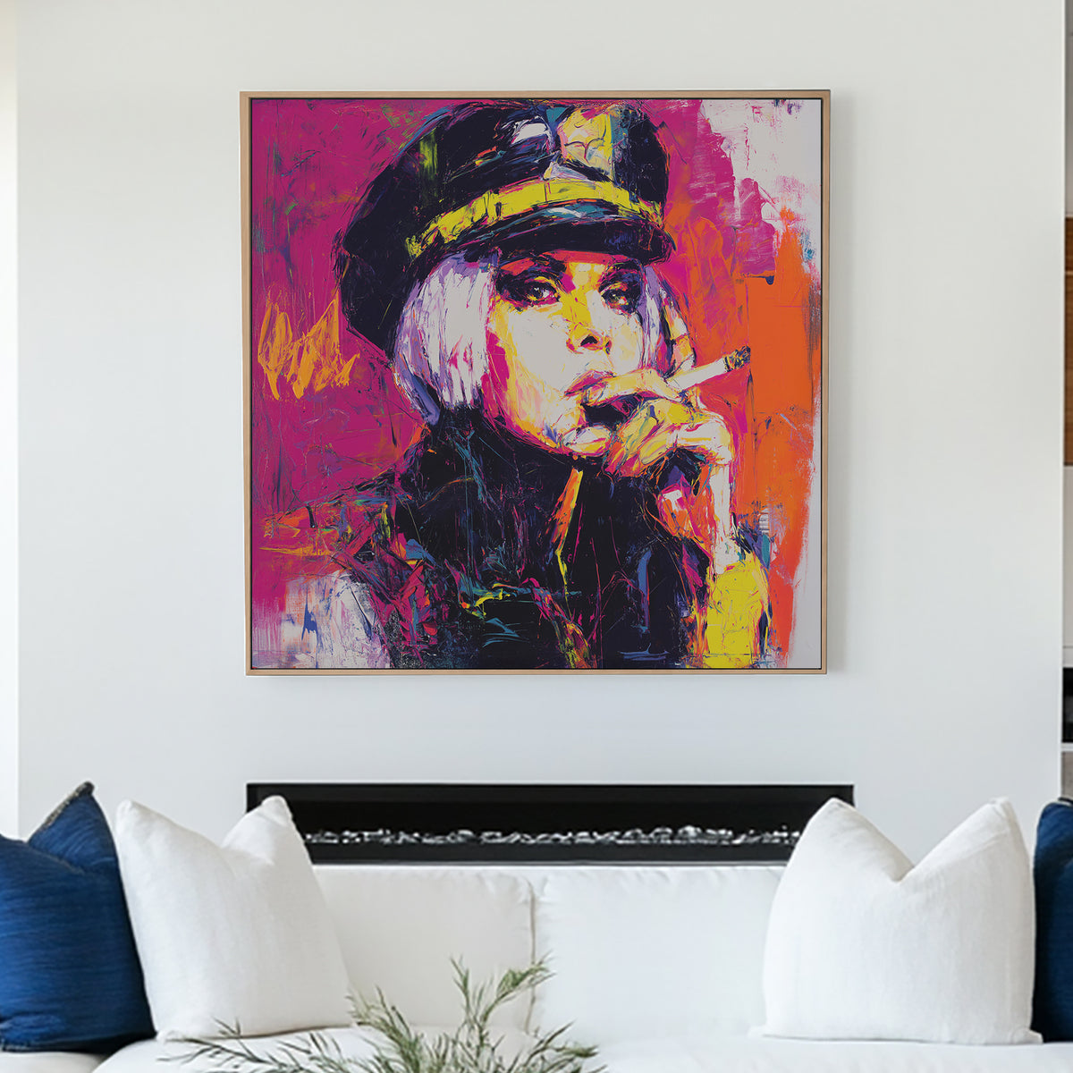 neon pop wall art of woman smoking in bold pink, orange and yellow paint strokes