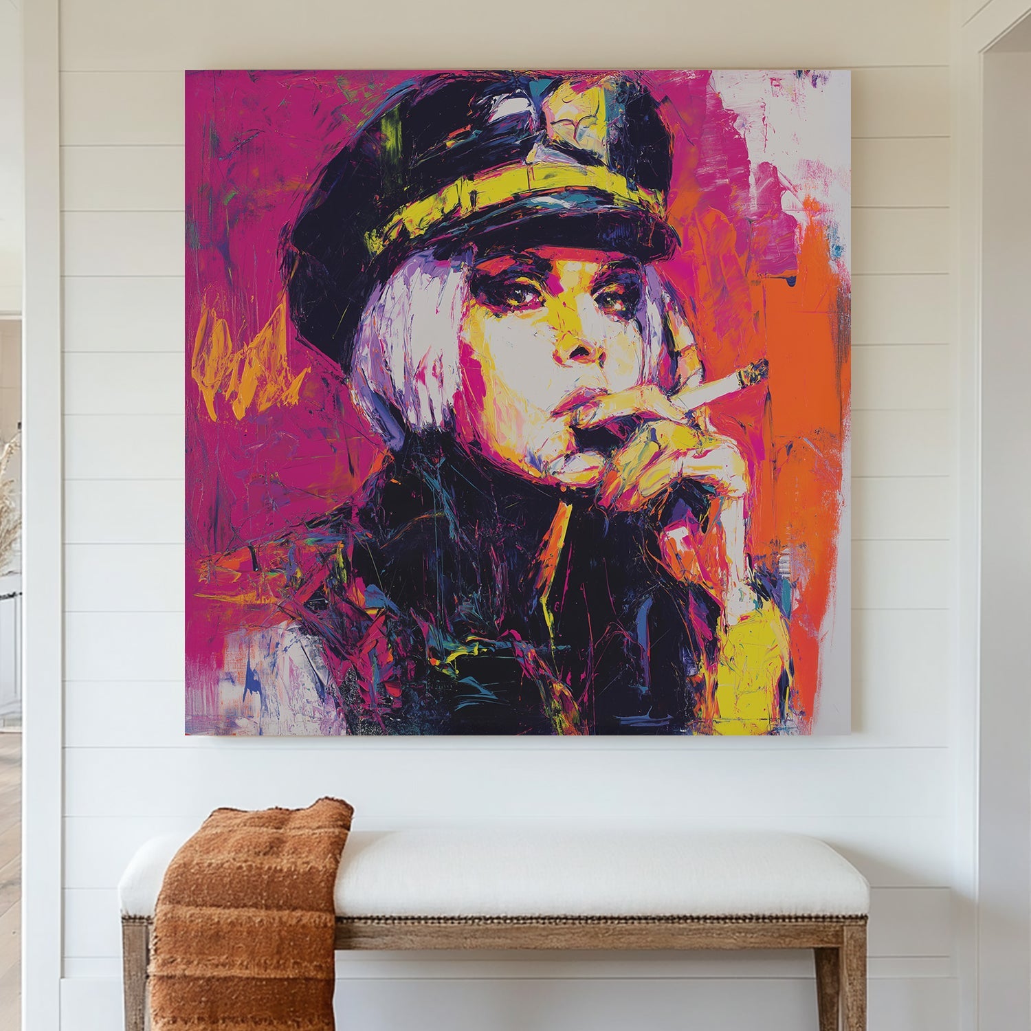 neon pop wall art of woman smoking in bold pink, orange and yellow paint strokes