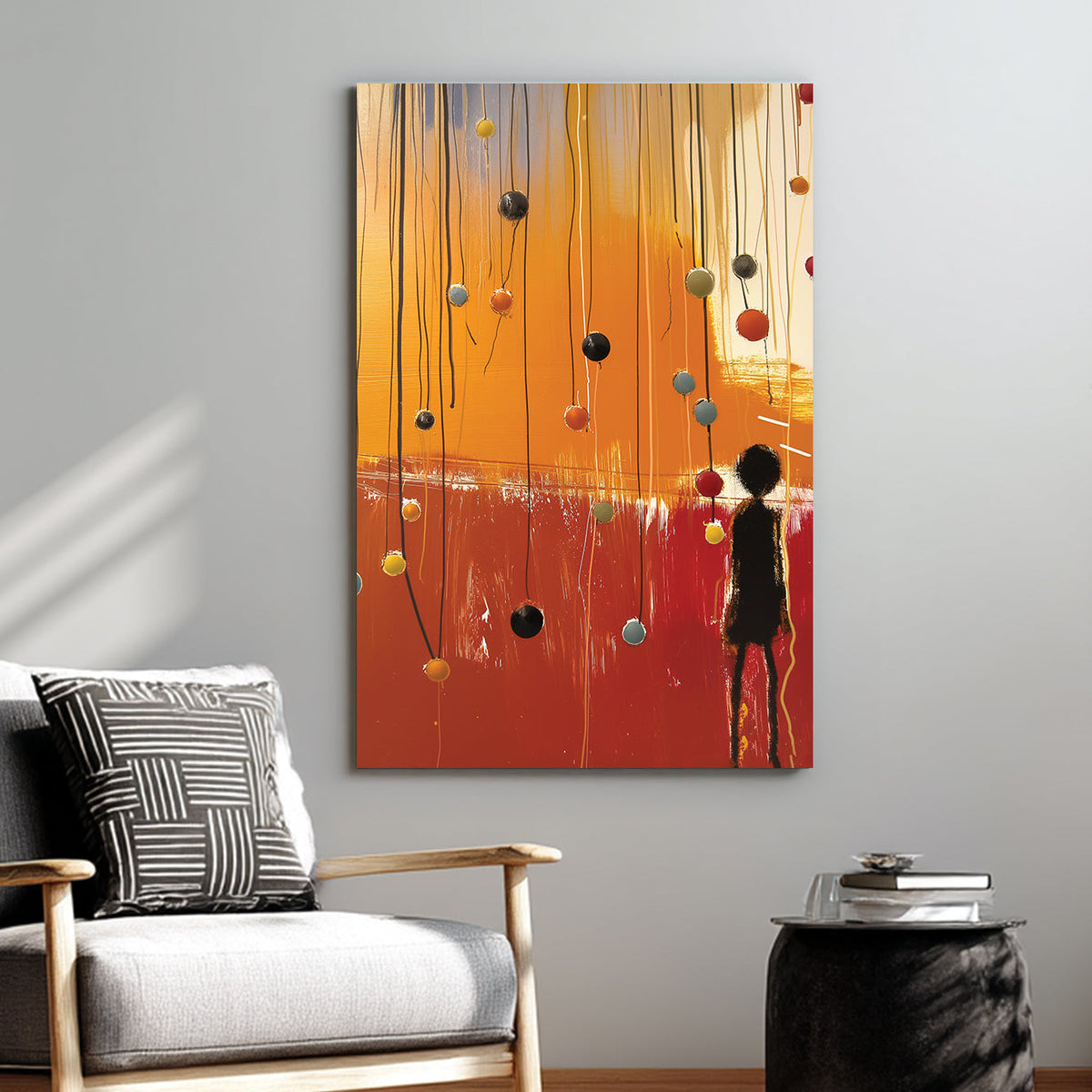 emotional abstract wall art with silhouette figure and colourful spheres on hanging wires