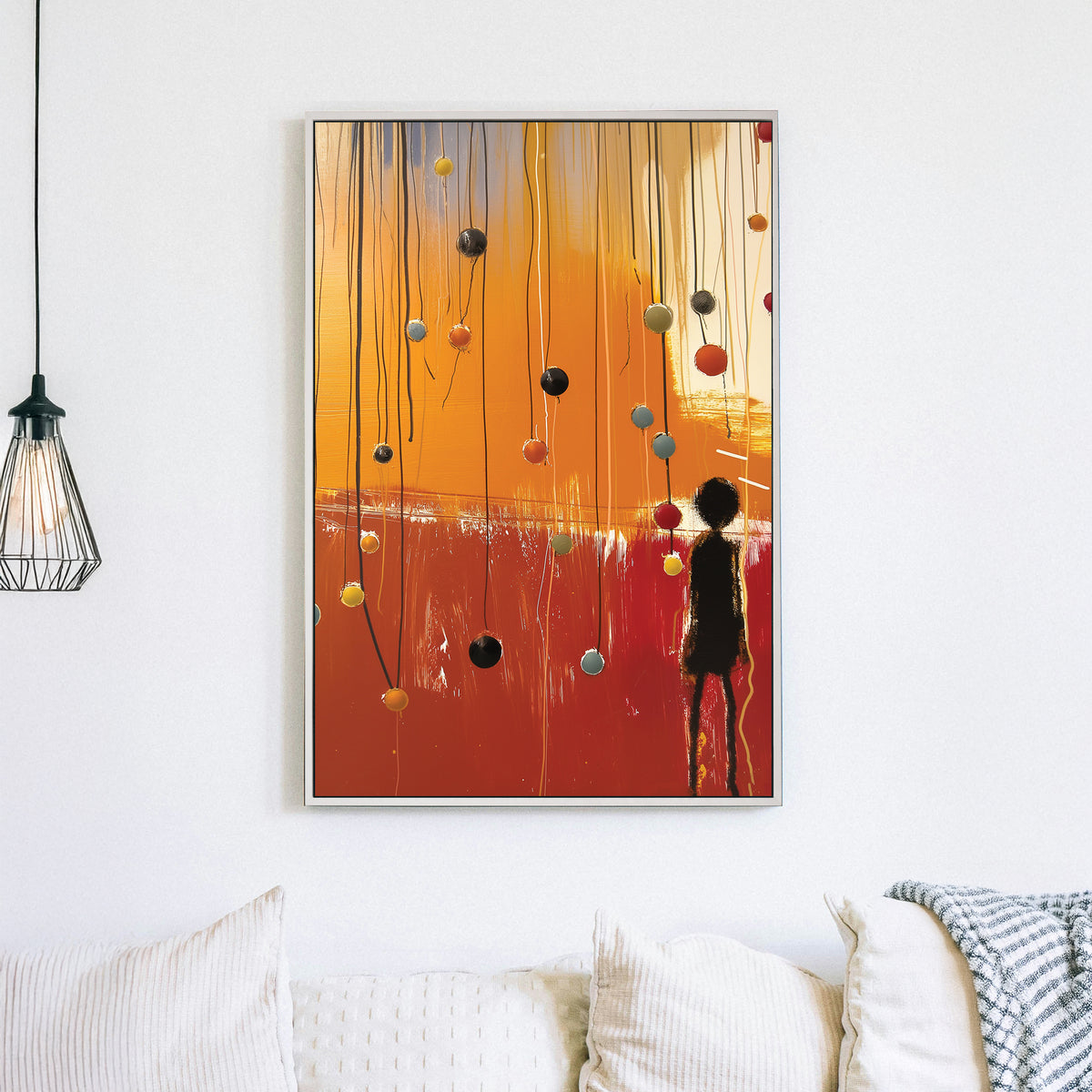 emotional abstract wall art with silhouette figure and colourful spheres on hanging wires
