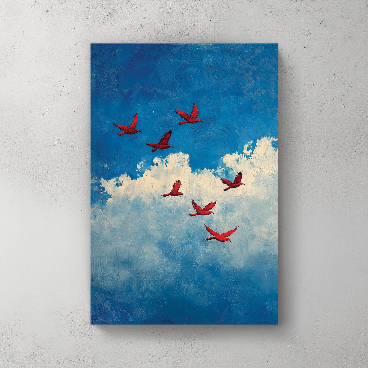Wall art of red birds flying across a blue sky with textured white clouds