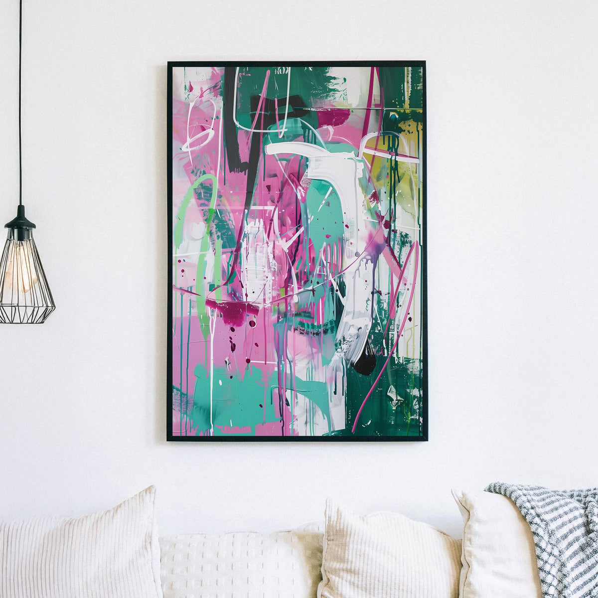 Wall art with abstract graffiti-style brushstrokes in pink, green, and white