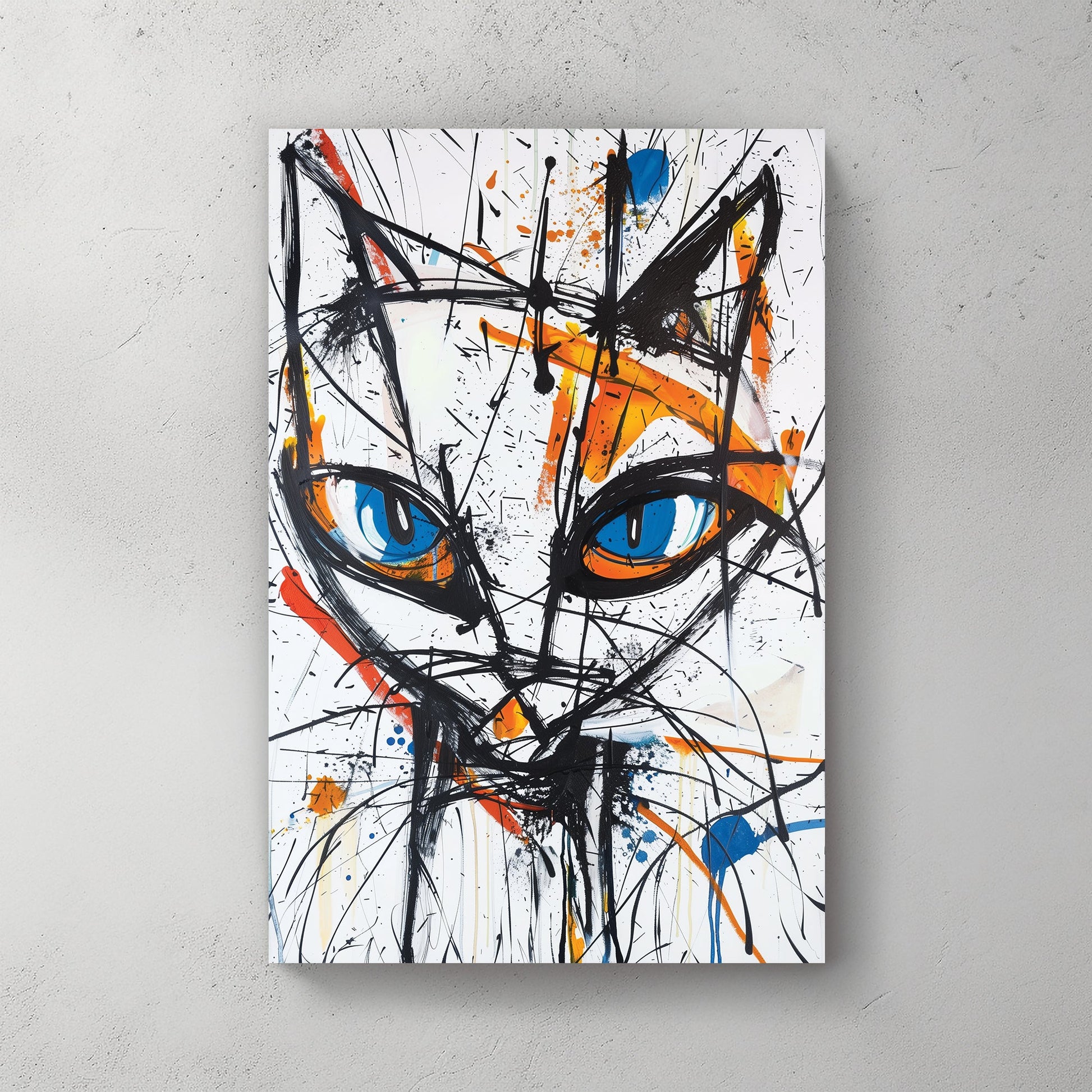 Wall art featuring abstract cat face with blue eyes and expressive paint splashes