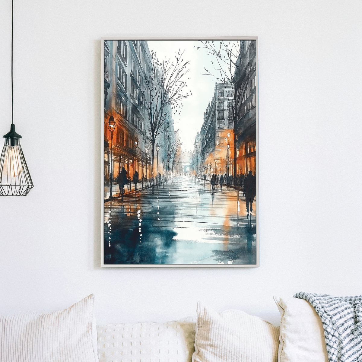 Wall art of a rainy city street with glowing windows and people walking