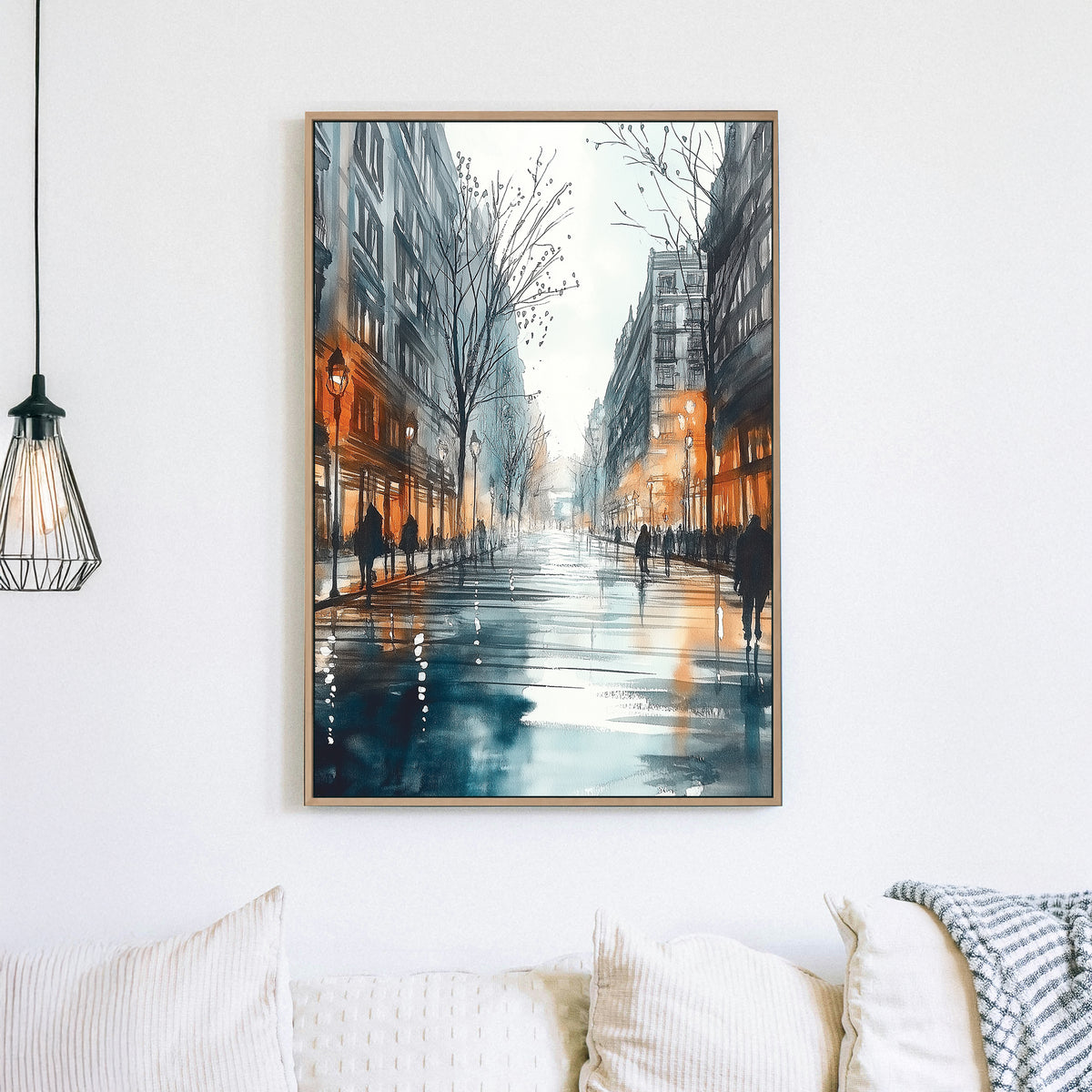 Wall art of a rainy city street with glowing windows and people walking
