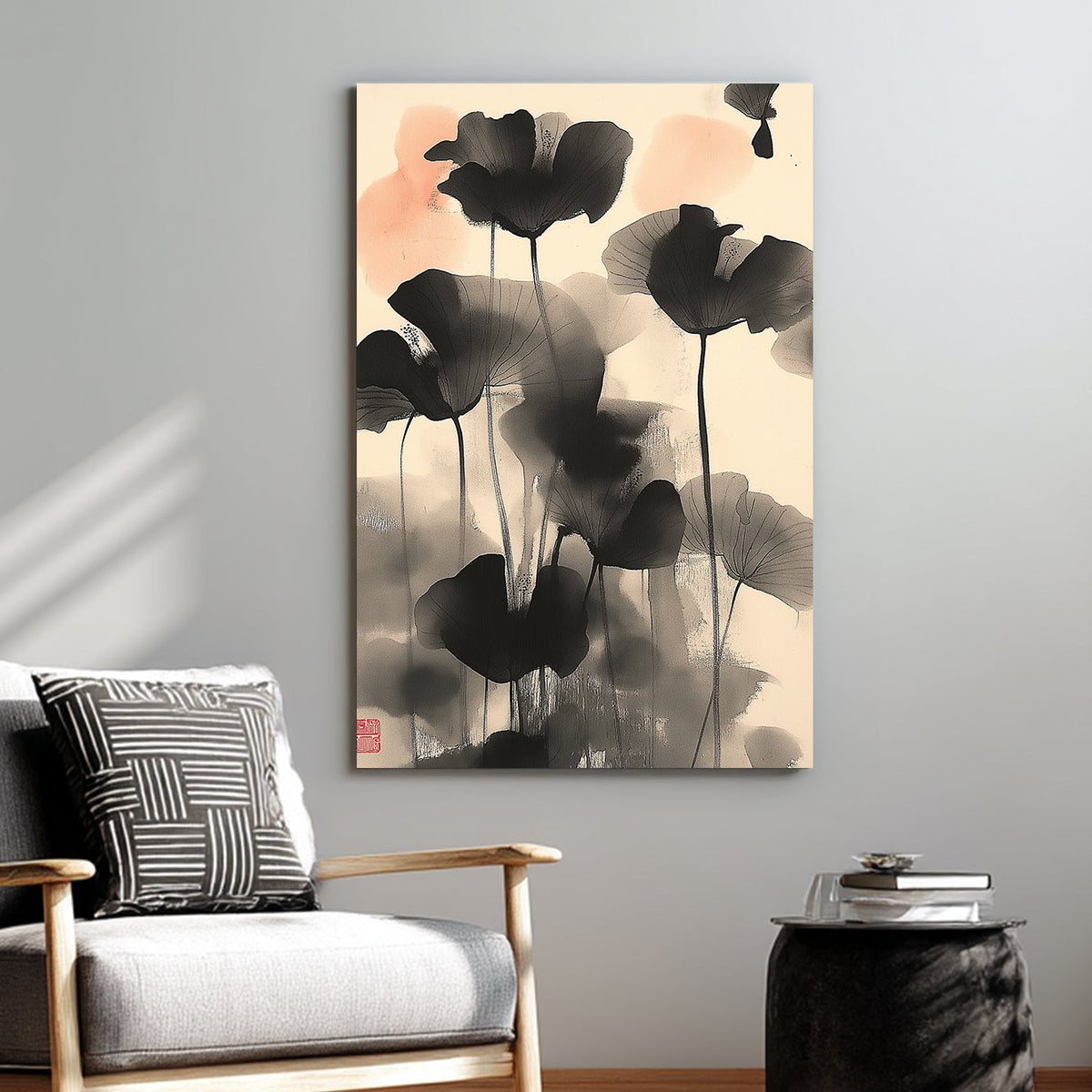 Wall art of abstract black lotus flowers in Japanese ink style with soft coral accents