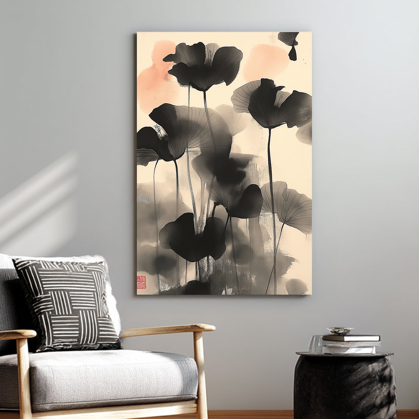 Wall art of abstract black lotus flowers in Japanese ink style with soft coral accents