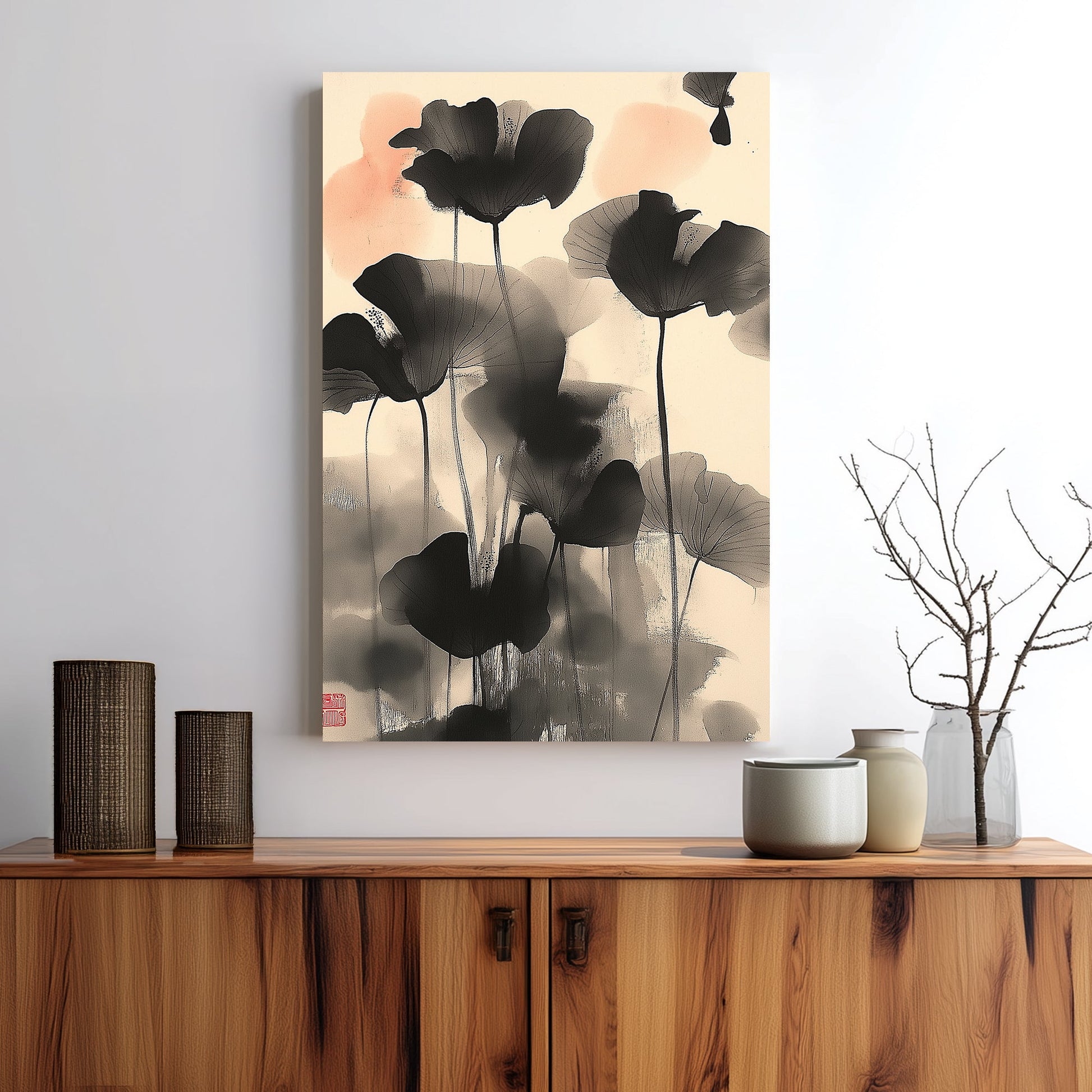 Wall art of abstract black lotus flowers in Japanese ink style with soft coral accents