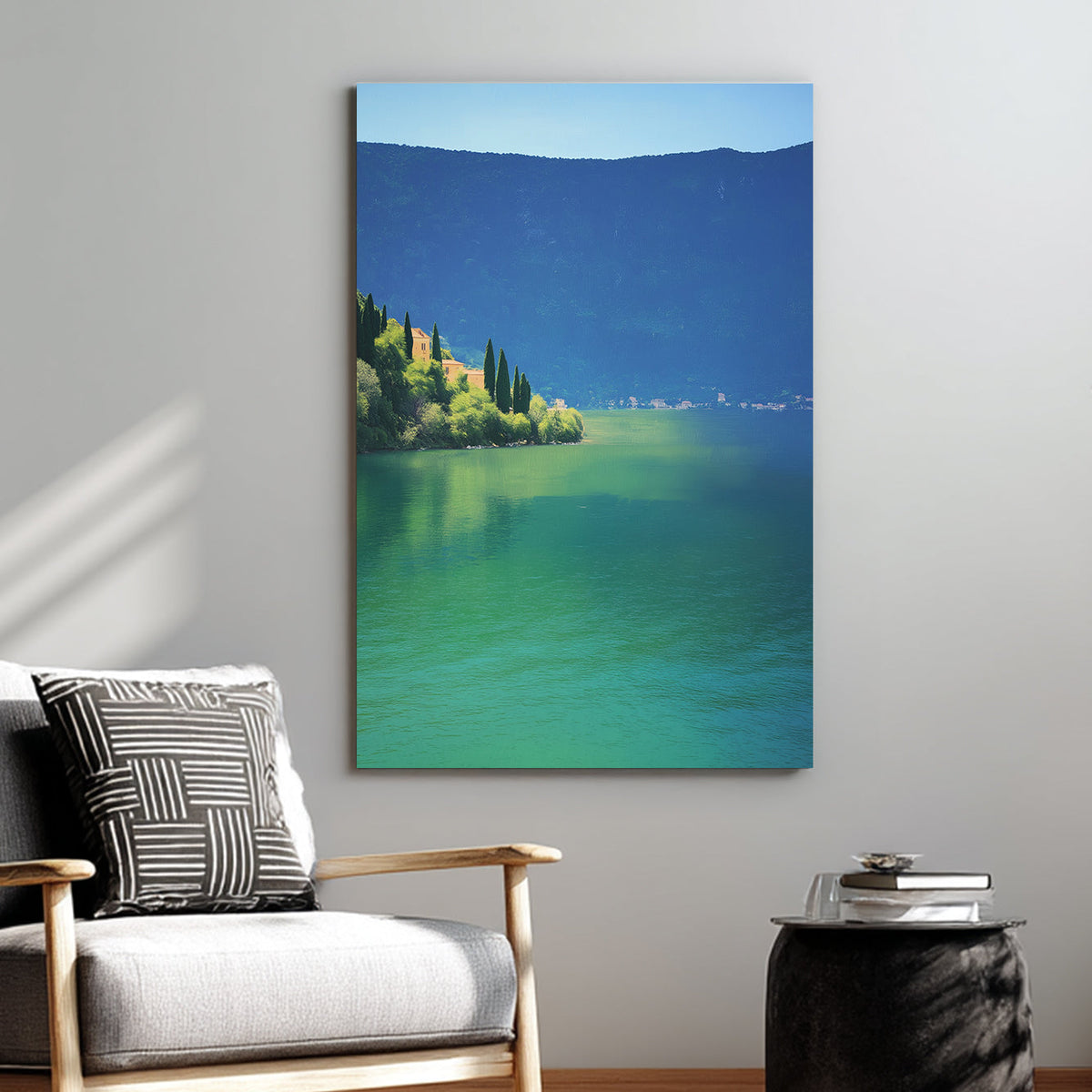 Wall art of a tranquil lakeside village surrounded by hills and still water