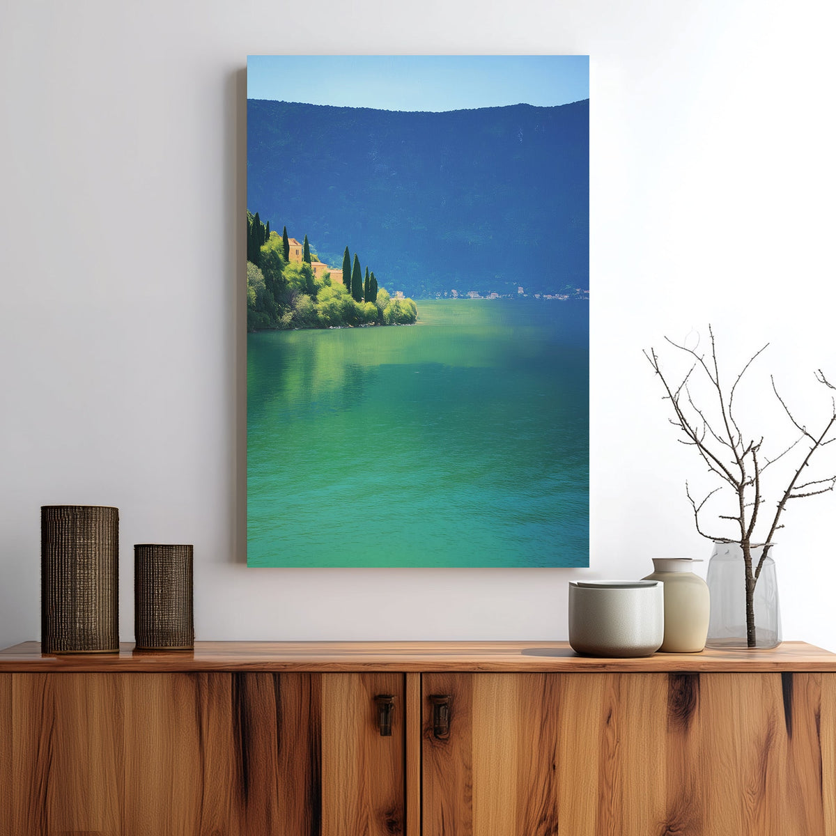 Wall art of a tranquil lakeside village surrounded by hills and still water