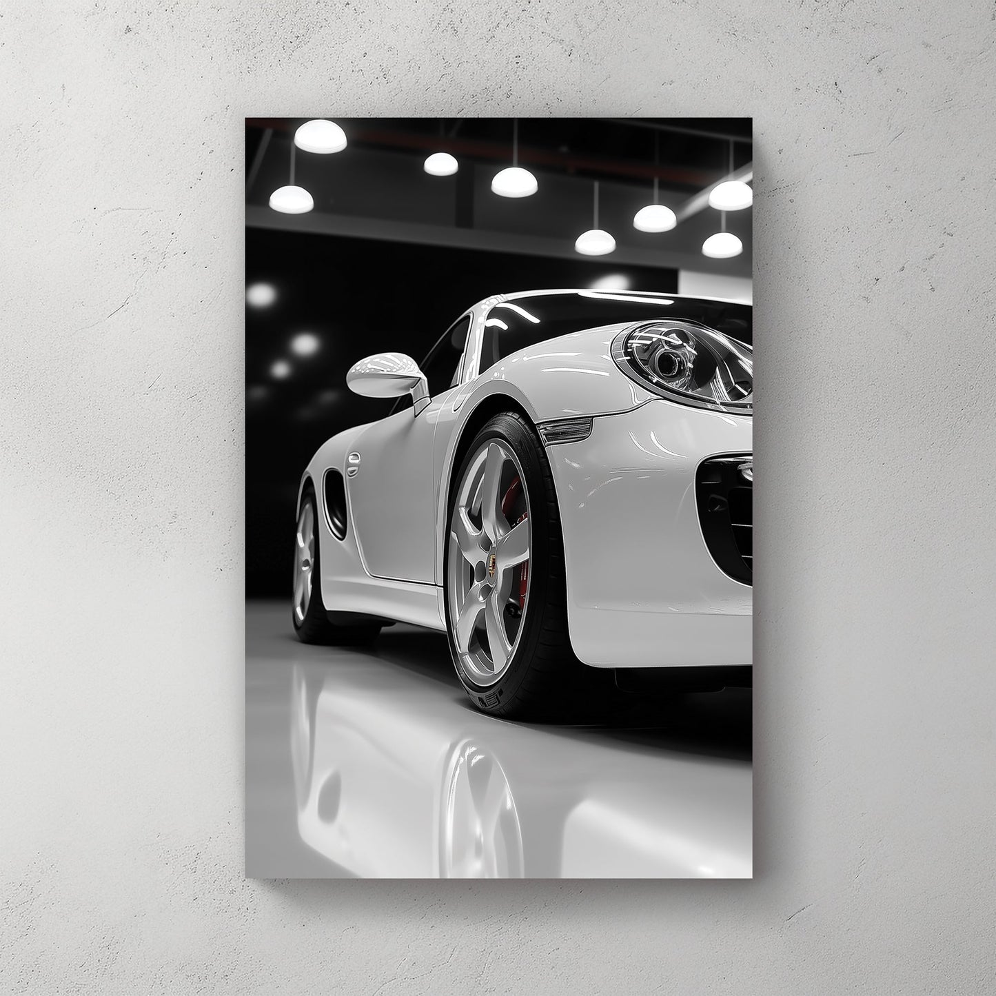 Luxury Porsche wall art in glossy white showroom setting
