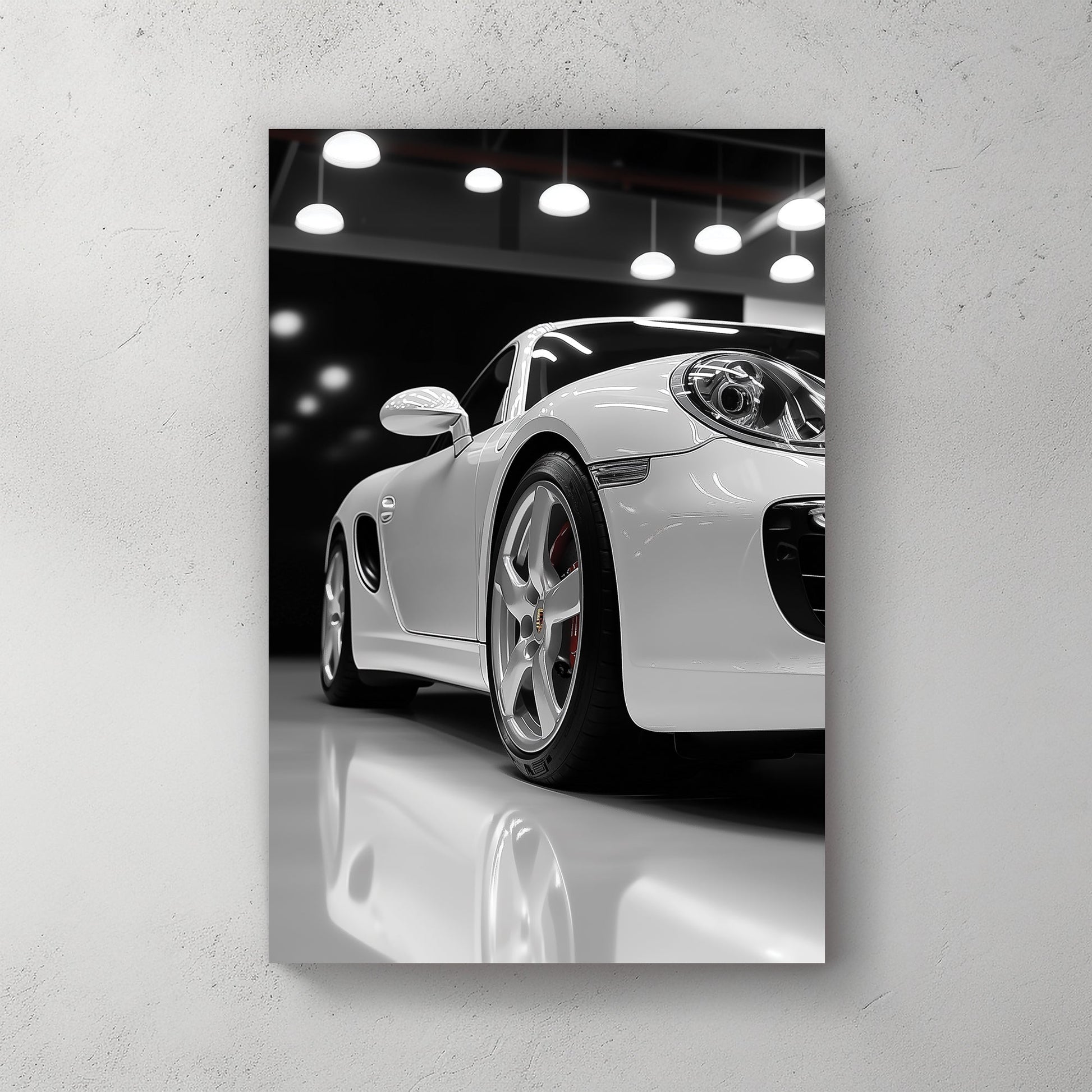 Luxury Porsche wall art in glossy white showroom setting