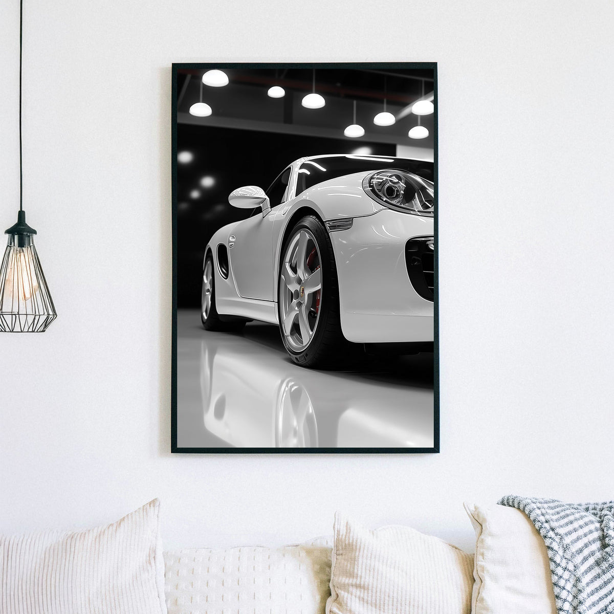 Luxury Porsche wall art in glossy white showroom setting