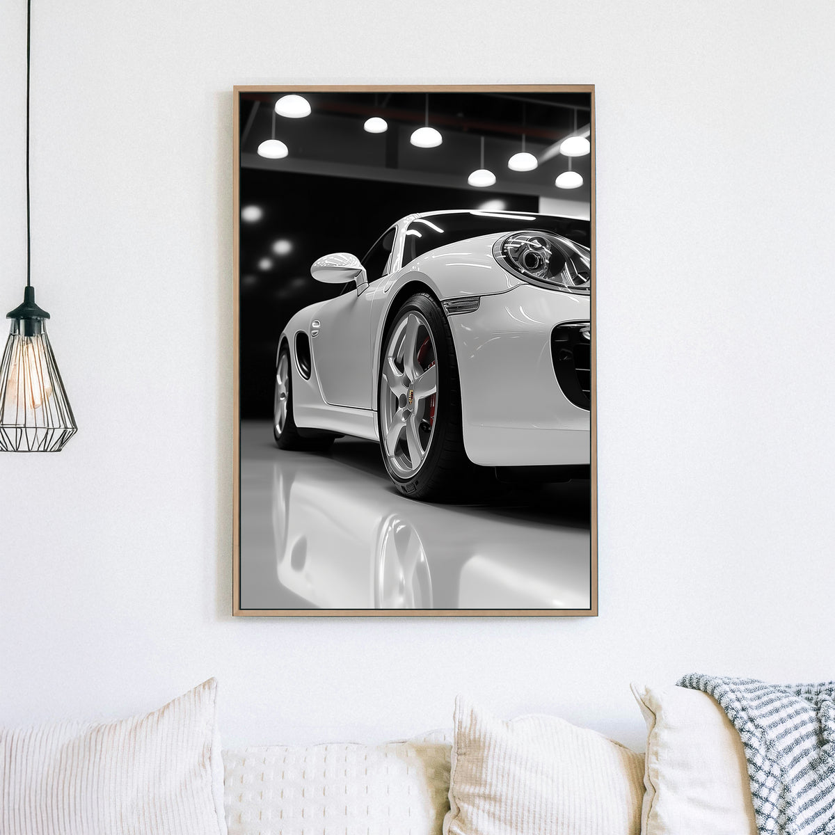 Luxury Porsche wall art in glossy white showroom setting