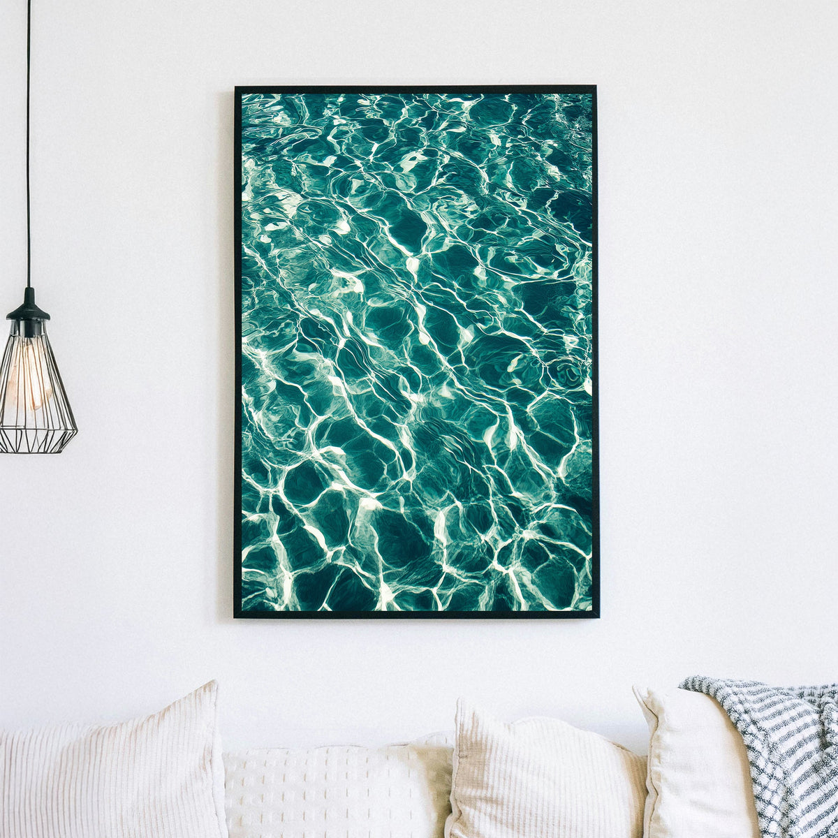 shimmering turquoise water wall art with sun reflections