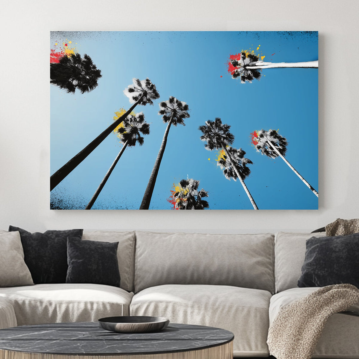 graffiti palm trees wall art with blue sky and paint splashes