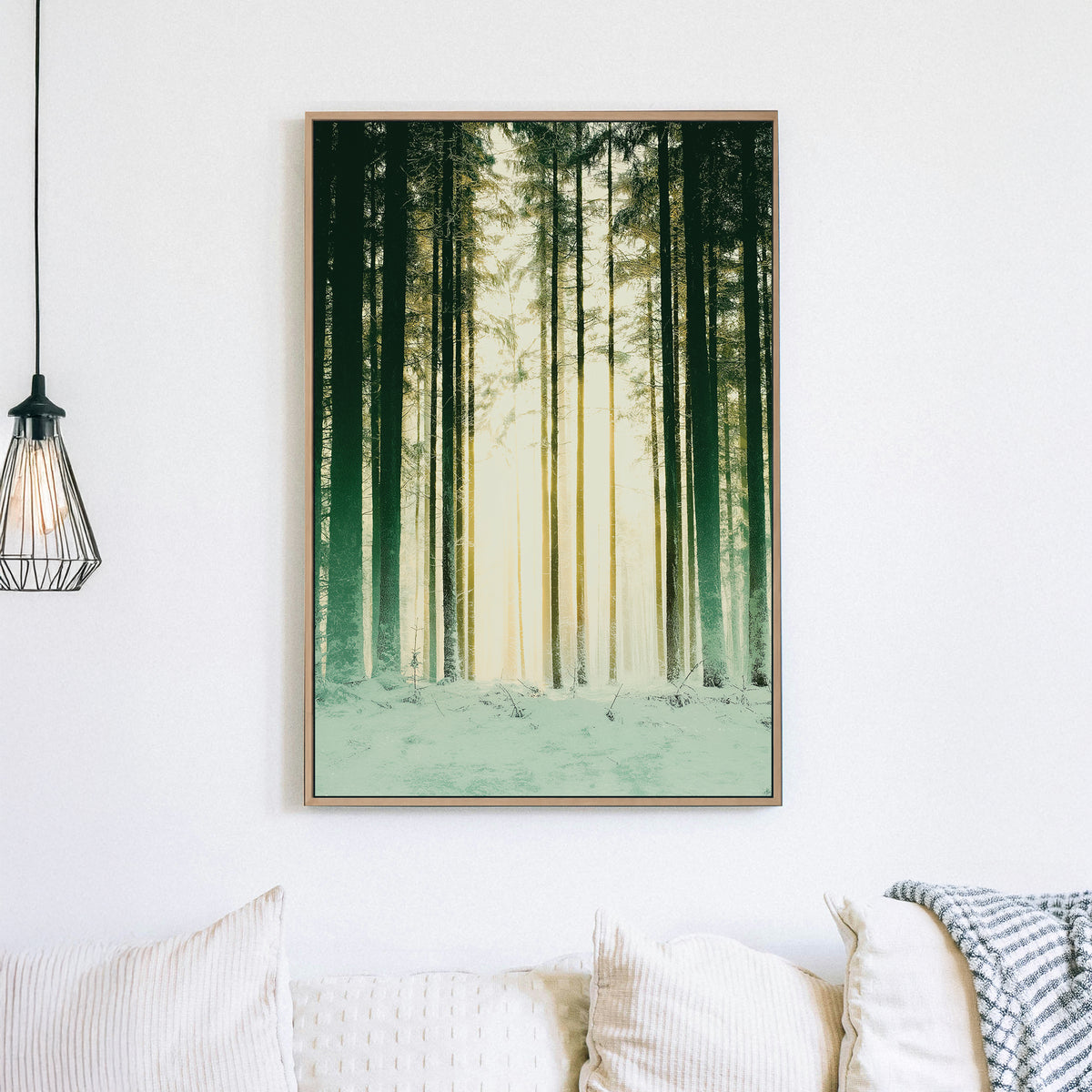 snowy forest with sunlight through pine trees wall art
