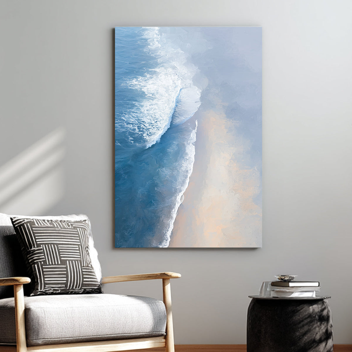 aerial painting of soft ocean waves meeting a sandy beach